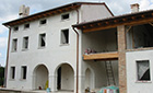 Ricostruzione casa rurale. Facciata anteriore Ricostruzione casa rurale. Facciata anteriore realizzata dall'architetto Barutta