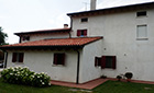 Ricostruzione casa rurale. Facciata dietro Ricostruzione casa rurale. Facciata dietro realizzata dall'architetto Barutta	