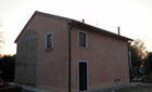 Ristrutturazioni case rurali. Facciata laterale	 Ristrutturazioni case rurali. Facciata laterale della casa realizzata dall'architetto Barutta	