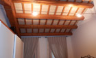 Ricostruzione casa rurale ed annesso rustico. Travi Ricostruzione casa rurale ed annesso rustico. Travi realizzati dall'architetto Barutta	